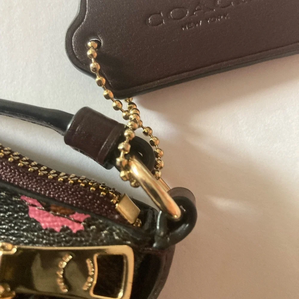 Coach Brown Crossbody Bag with Floral Accents like new